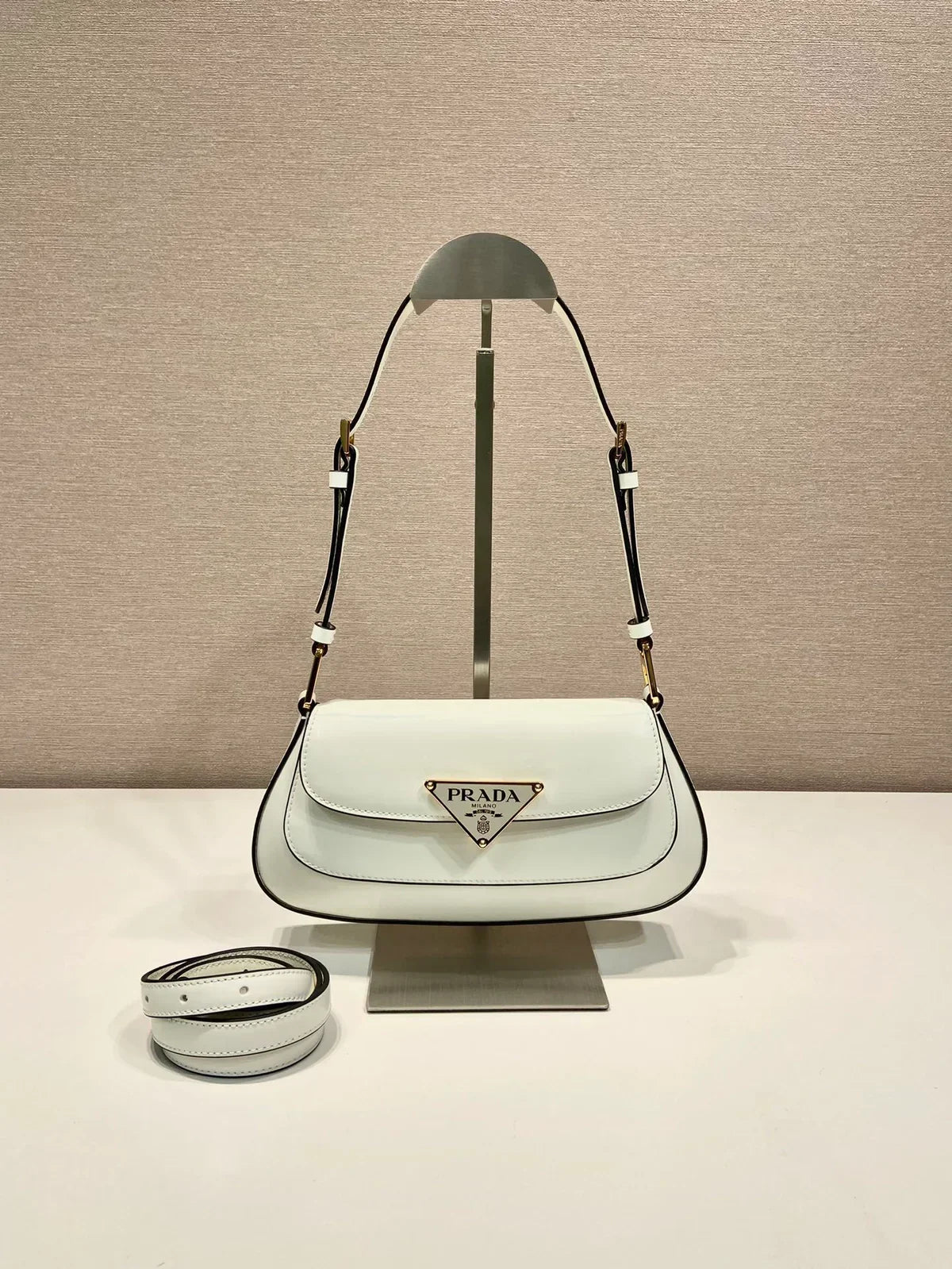 Curved Flap Shoulder Bag in White Leather with Black Edging