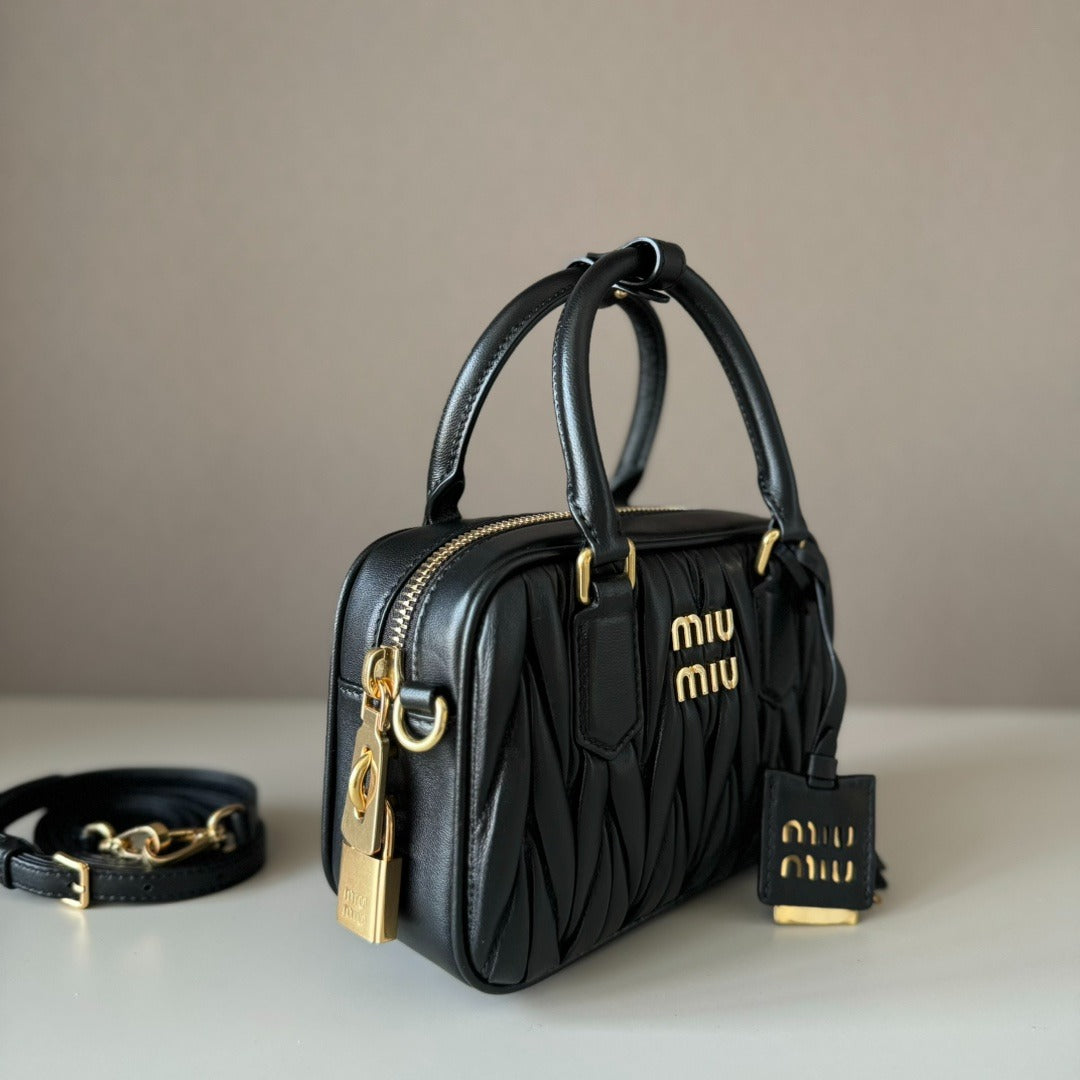 Mini Bowling Bag in Black Quilted Leather with Gold Padlock
